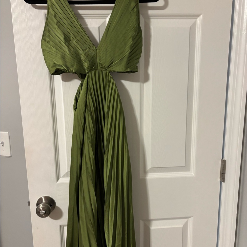 Green pleated wedding guest dress